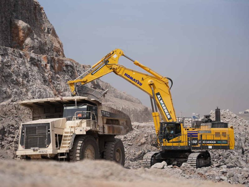 Komatsu PC1250 working with a Terex TR100 hauler